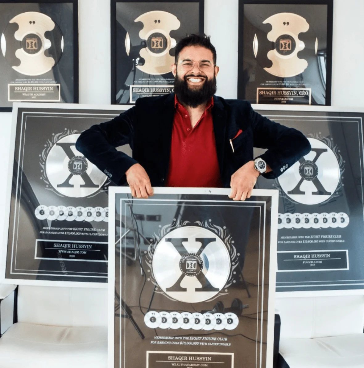 Shaqir Hussyin with his ClickFunnels Two Comma Club X award